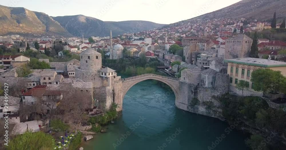 Aerial view of Stari Most, Mostar Bosnia, drone flies backwards over the river Aerial view of Stari Most, Mostar Bosnia, drone flies backwards over the river