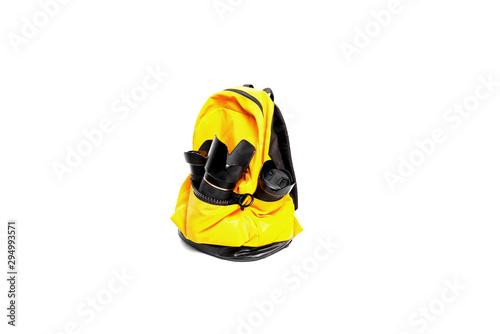 Yellow Backpack Photographer's equipment , isolated on white background.