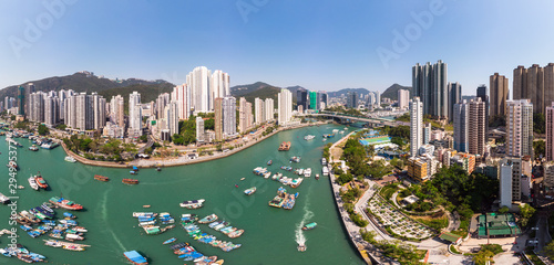Aerial panorama of the crowded Aberdeen and Ap Leu Chau island in Hong Kong and the sampan traditional boats photo
