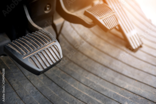 Foot pedals are levers of forklift car that are activated by the driver's feet to control certain aspects of the vehicle's operation brake pedal Car accelerator  controls. photo