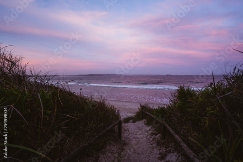 Epic pink and purple sunset over Cosy Corner Beach in Albany, Western Australia. Beautiful vibrant colours in the sky over the beach.  © Dylan Alcock