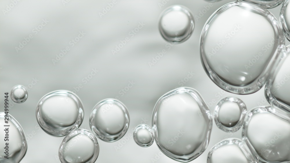 transparent gas bubbles on water surface. Worms-eye low angle with crystal bubbles in purified water on white background. cosmetic backdrop with copy space