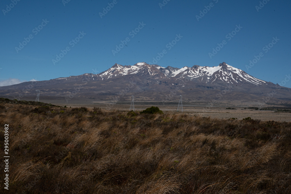 The snow capped volcanic mountains in New Zealand's Desert Road