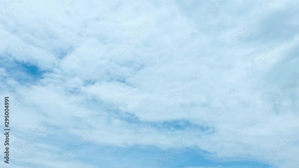 Time lapse,sky beautiful cloud scape white fluffy clouds over blue sky. Time lapse,sky beautiful cloud scape white fluffy clouds over blue sky.