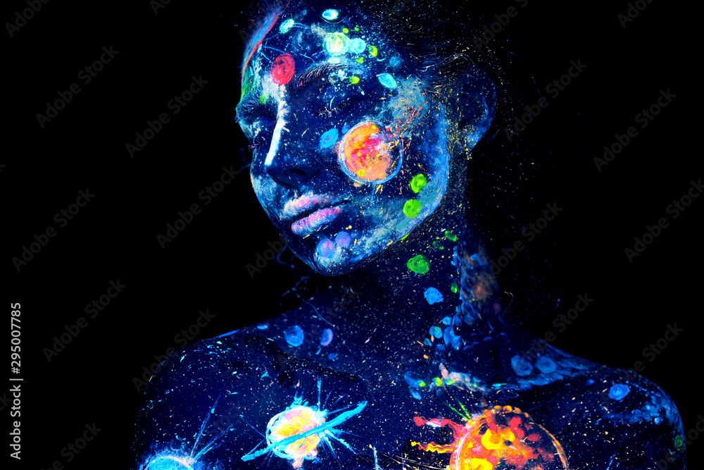 UV painting of a universe on a female Halloween body portrait - obrazy, fototapety, plakaty 