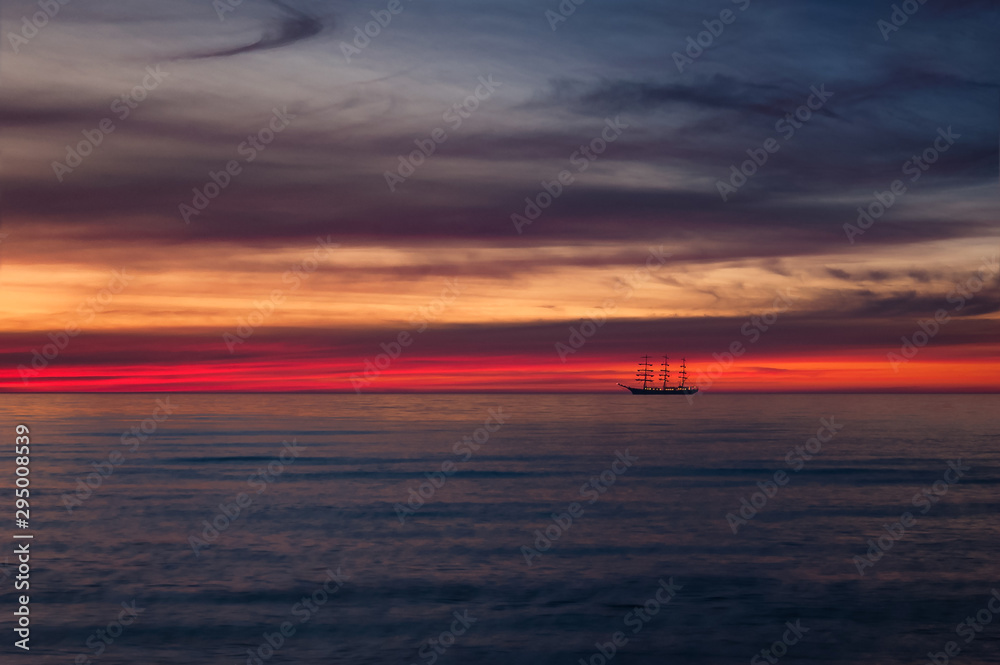 FRIGATE AND SUNSET - Evening dream of a beautiful sailing ship at sea