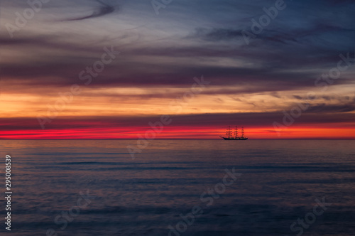 FRIGATE AND SUNSET - Evening dream of a beautiful sailing ship at sea © Wojciech Wrzesień