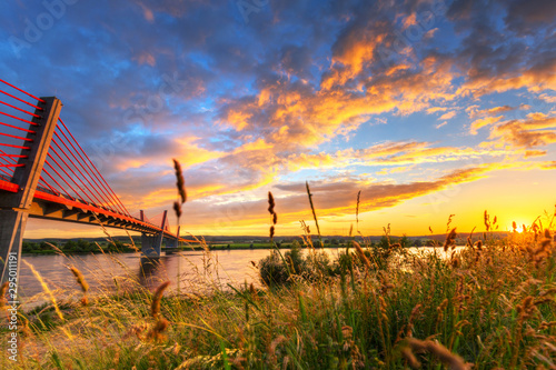 Sunset at Vistula river and cable stayed bridge of Kwidzyn, Poland