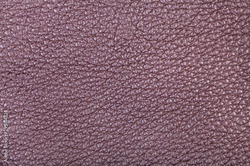 background from purple brown leather close up