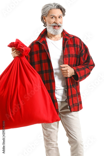 Portrait of stylish Santa Claus with bag on white background