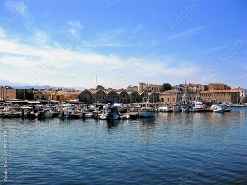 The coastal area, old harbour and the characteristic Venetian buildings in Chania town, Crete, Greece.