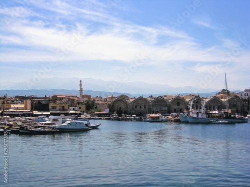 The coastal area, old harbour and the characteristic Venetian buildings in Chania town, Crete, Greece.