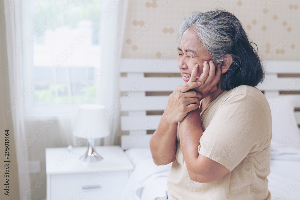 Asian senior woman patients Toothache hurts - Elderly patients medical and healthcare concept Asian senior woman patients Toothache hurts - Elderly patients medical and healthcare concept