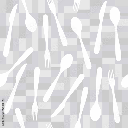 Seamless pattern of disorganized forks, knives and spoons. Tile background. Easy to edit colors in Illustrator.