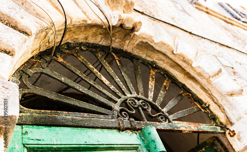 Detail of an old and demaged door. photo