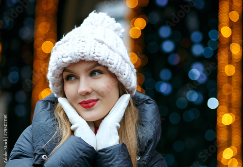 Attractive girl enjoying winter holidays