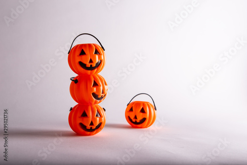 Halloween funny pumpkins pile. white background  Halloween decorations