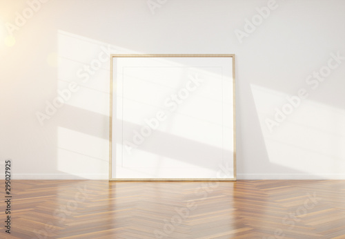 Fototapeta Naklejka Na Ścianę i Meble -  Wooden frame leaning in bright white interior with wooden floor mockup 3D rendering