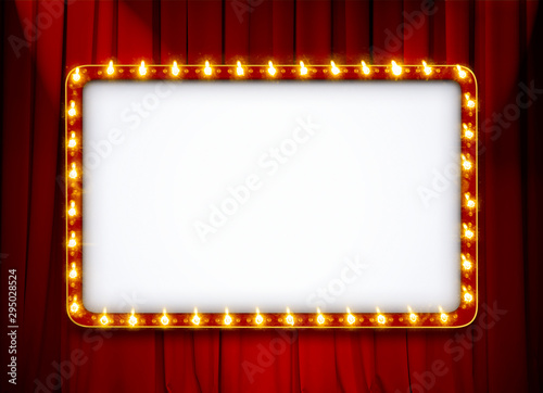 Blank light sign frame on red theatre curtain