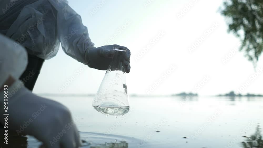 Scientist tests water for infections, harmful emissions