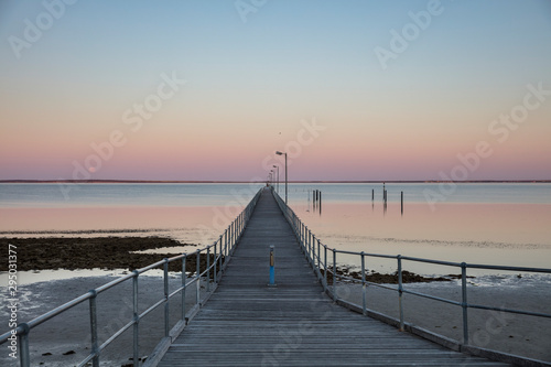 The moon and pier at Ceduna in South Australia at dawn