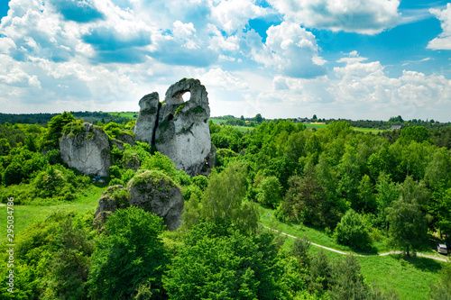 A panoramic view of the unique Okiennik rock in Poland with a large natural window