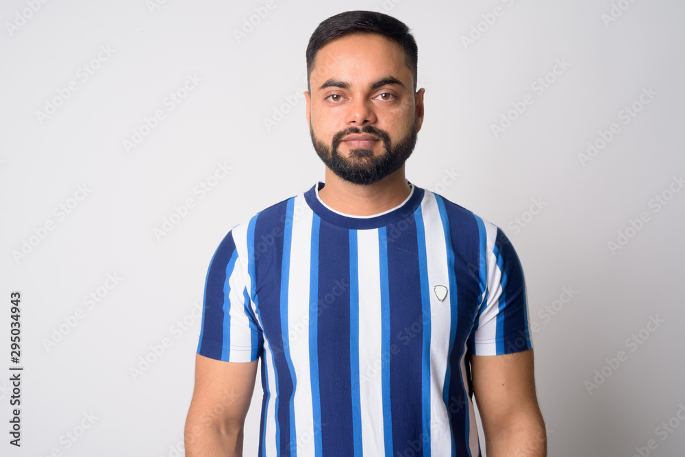 Portrait of young handsome bearded Indian man Portrait of young handsome bearded Indian man