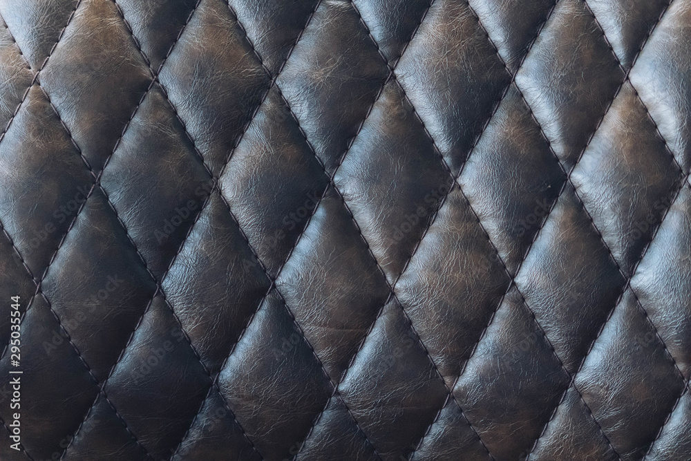 Fototapeta premium Vintage dark brown leather texture with stitch