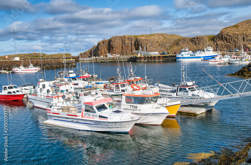STYKKISHOLMUR, ICELAND - AUGUST 9, 2019: City port with boats on a beautiful summer day