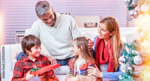 Wallpaper Mural Holidays and celebration concept - Happy family at home celebrating Christmas day Torontodigital.ca