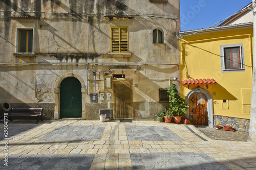 Fototapeta Naklejka Na Ścianę i Meble -  Province of Salerno, Italy, 10/10/2016. A small street among the old houses of a medieval village of Contursi.