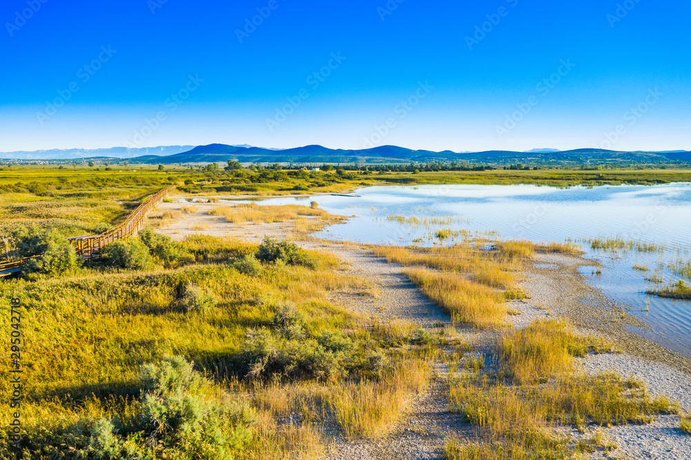 Nature park Vransko lake, ornithological reservation in Dalmatia, Croatia, wooden observation path from air Nature park Vransko lake, ornithological reservation in Dalmatia, Croatia, wooden observation path from air