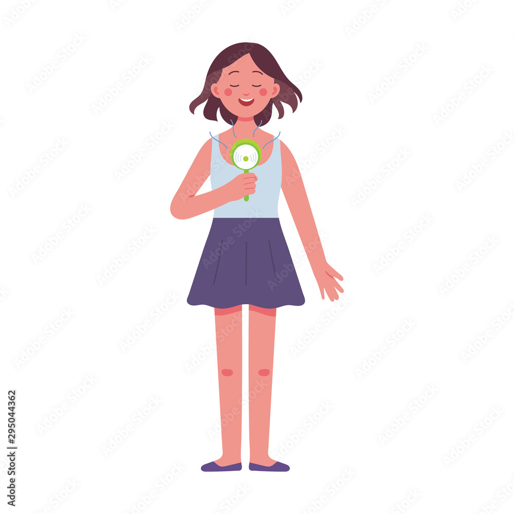young women holding electric hand fans enjoy the fresh breeze on a hot summer day young women holding electric hand fans enjoy the fresh breeze on a hot summer day
