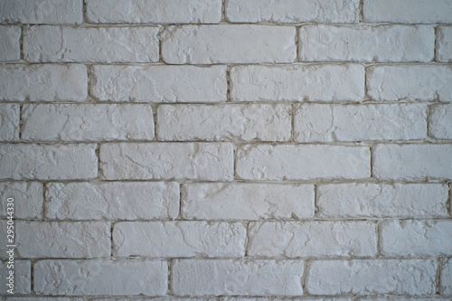 A wall of white bricks.