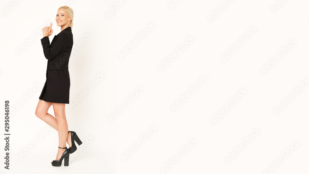 Elegant business woman in black jacket isolated on white background. Elegant business woman in black jacket isolated on white background.