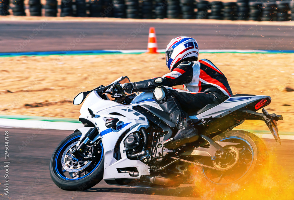 motorcycle racer rides on a sports track