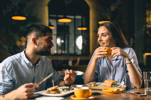 friends dinning outdoor at fancy restaurant