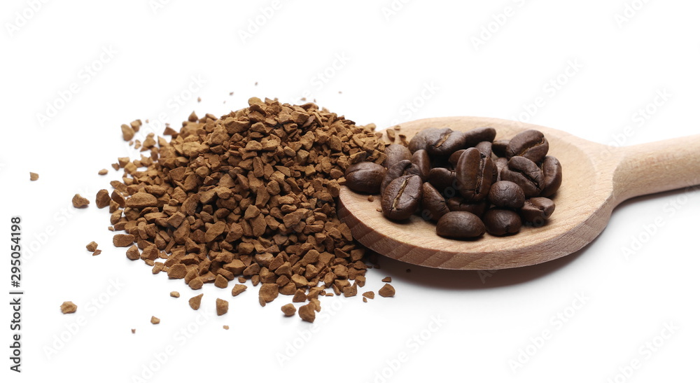 Instant coffee granules and beans with wooden spoon, isolated on white background Instant coffee granules and beans with wooden spoon, isolated on white background