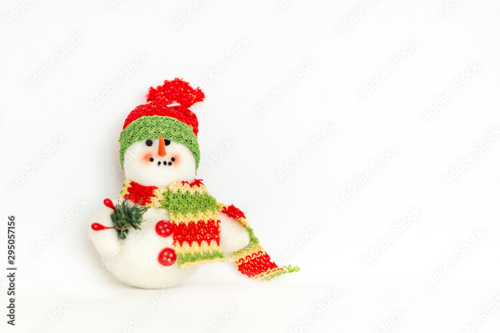 New year, Christmas, toy snowman close up macro isolated on the white background New year, Christmas, toy snowman close up macro isolated on the white background