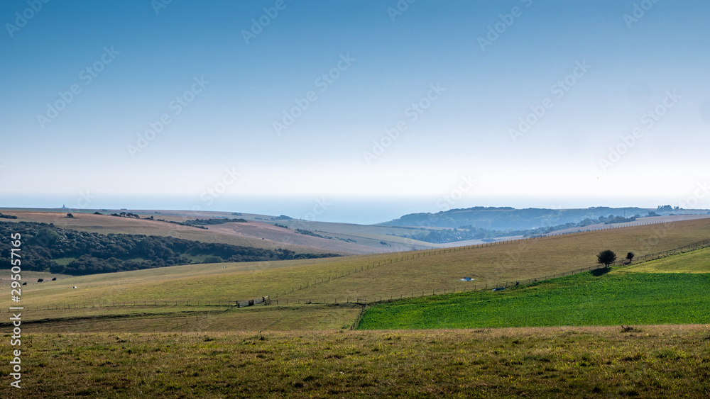 The South Downs, East Sussex, England. The landscape and countryside of the British south coast looking out towards the coast and the English Channel.