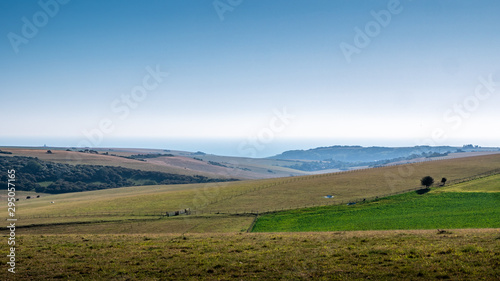 The South Downs, East Sussex, England. The landscape and countryside of the British south coast looking out towards the coast and the English Channel.