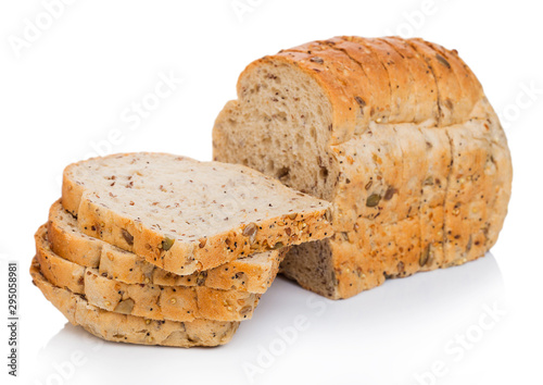 Obraz na plátně Cut of fresh loaf of seeded bread on white background