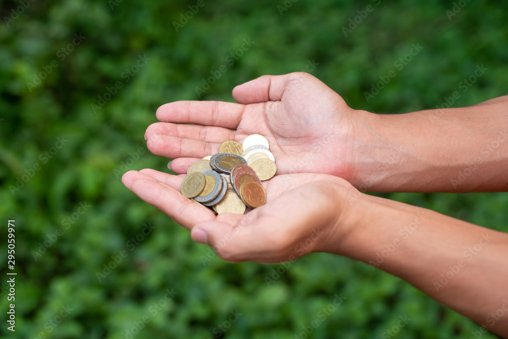 The baht is at hand. Green background The baht is at hand. Green background