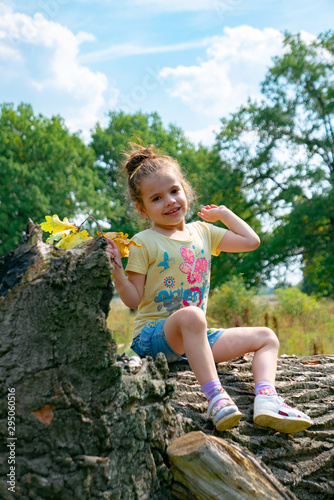 Little girl having fun on t...