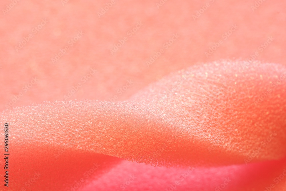 Fototapeta premium White and Pink artificial foam, foam texture on a light background.