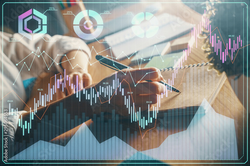 Wallpaper Mural Financial forex charts displayed on woman's hand taking notes background. Concept of research. Double exposure Torontodigital.ca