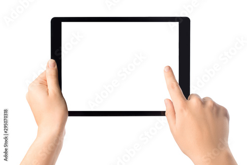 Girl holding modern tablet in hand with blank screen isolated on white background with space for your text