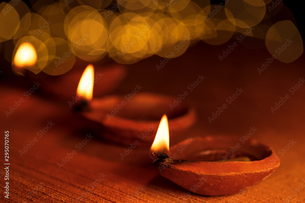 Illuminated Diya Oil Lamp During Diwali Celebration. Happy Diwali