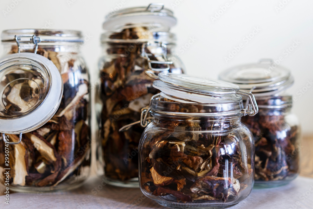 Fall harvests. Delicacy Dried boletus in the jars. ECO autumn forest