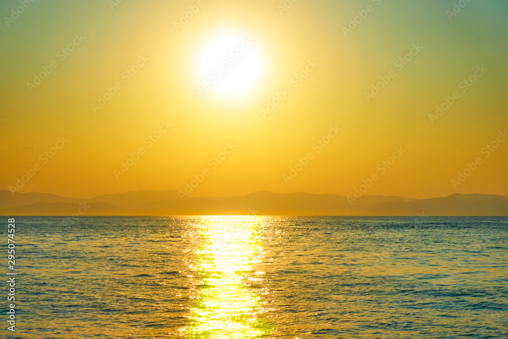 Bright sun over the sea